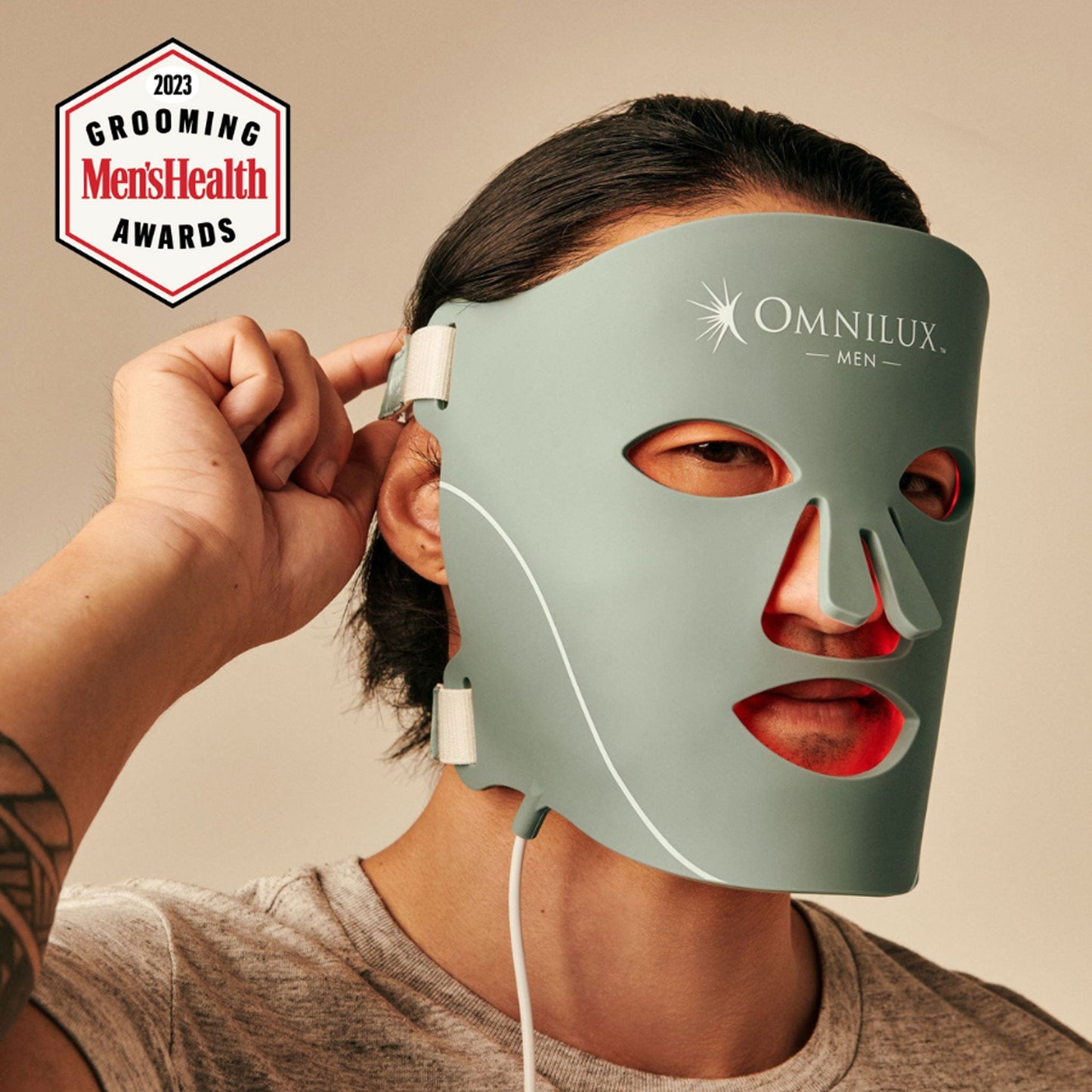 Omnilux Men LED light therapy mask in use