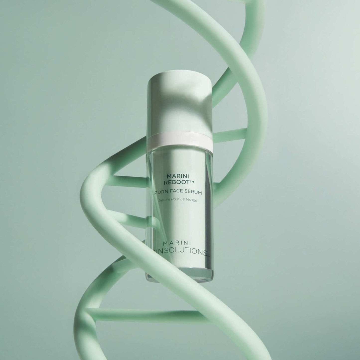 Marini Reboot™ PDRN Face Serum with a DNA strand on a light green background